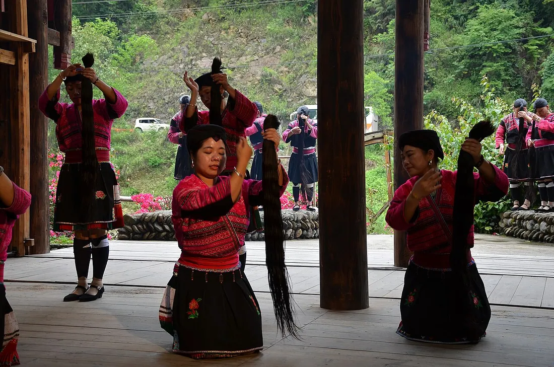 Red Yao women performing the long hair dance at Huangluo
